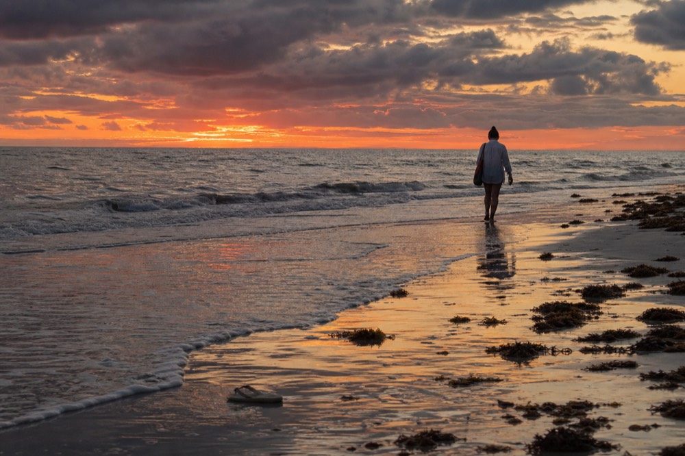 A wide orange sunset sky over open water near Key West, no text, no logos, no people