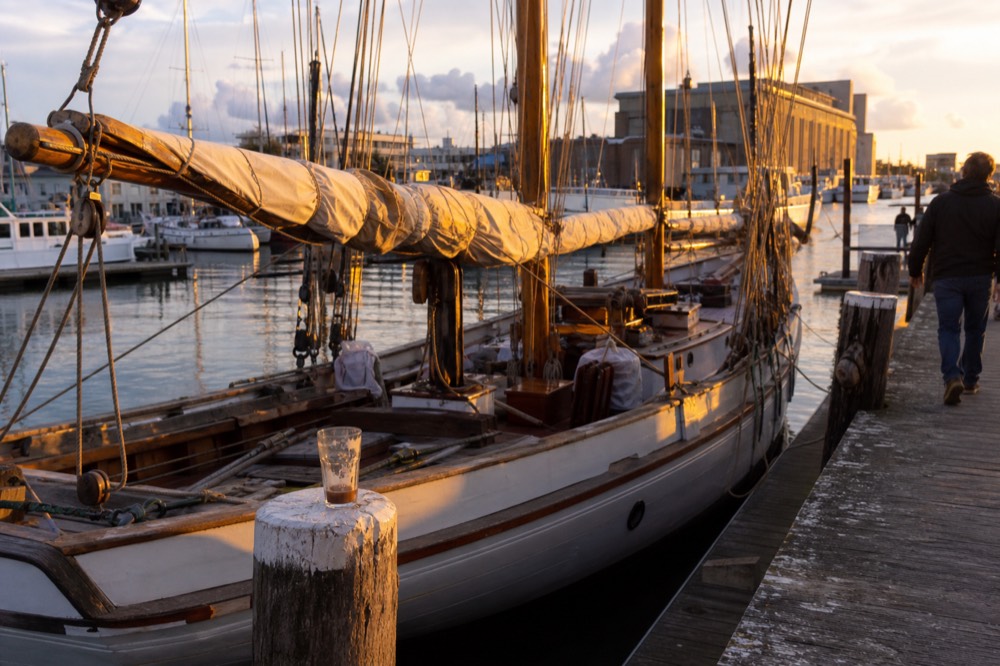 Golden light over the Historic Seaport marina in Key West with moored sailboats, no text, no logos, no people