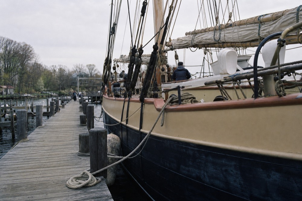 A US Coast Guard inspected passenger schooner tied up at a Key West dock, no text, no logos, no people